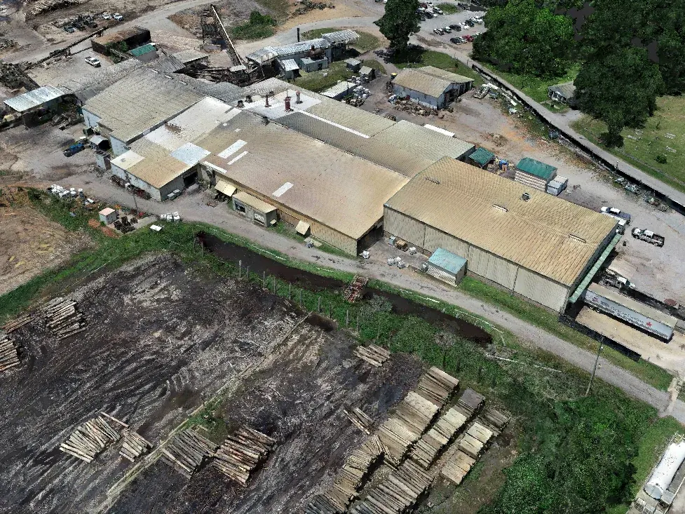Drone orthomosaic of a lumber yard and mill buildings