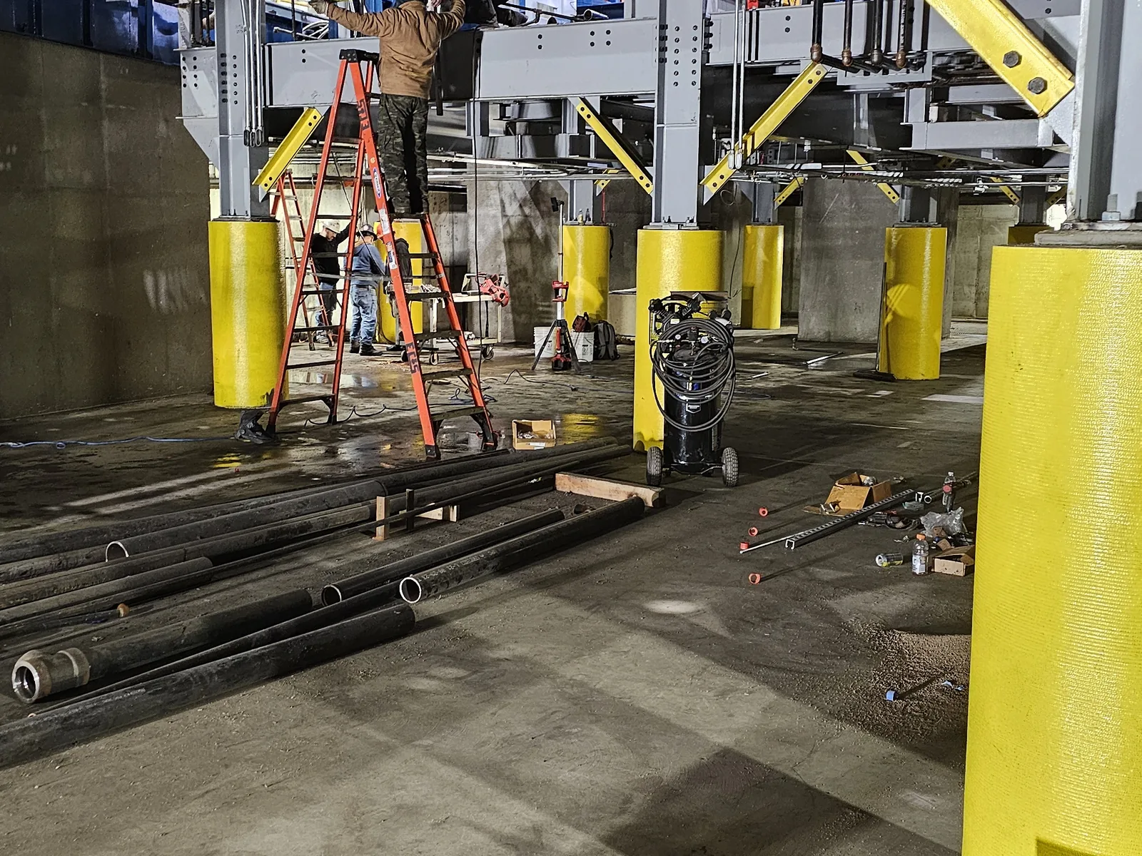 Industrial plant interior with equipment and structural columns